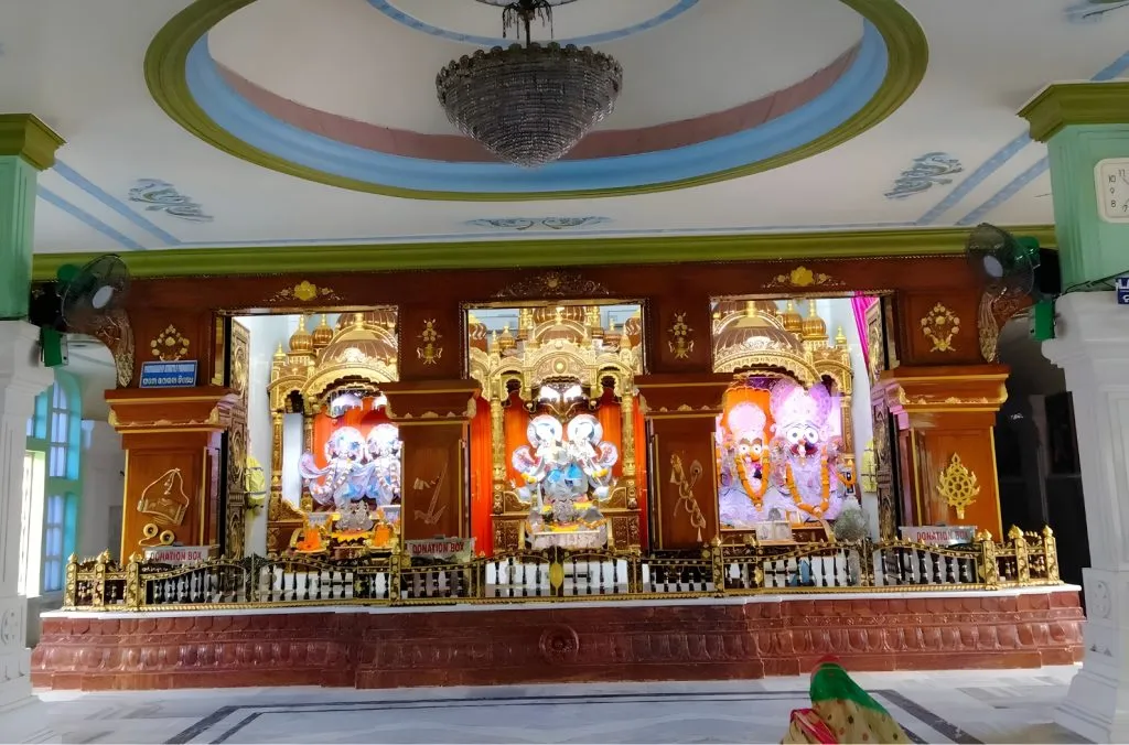 The main altar, with Lord Jagannath, Baladeva and Subhadra on the right