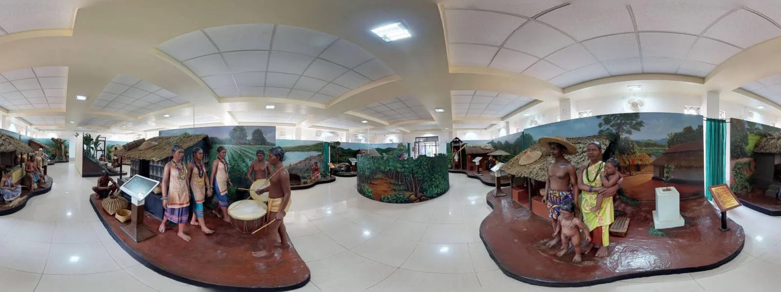 A panoramic diorama depicting tribal life