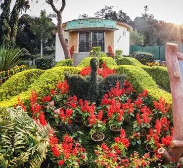 Landscaped gardens near the park entrance